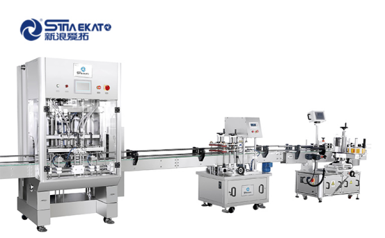 新浪愛拓灌裝旋蓋貼標(biāo)一體機 新浪愛拓灌裝旋蓋貼標(biāo)一體機